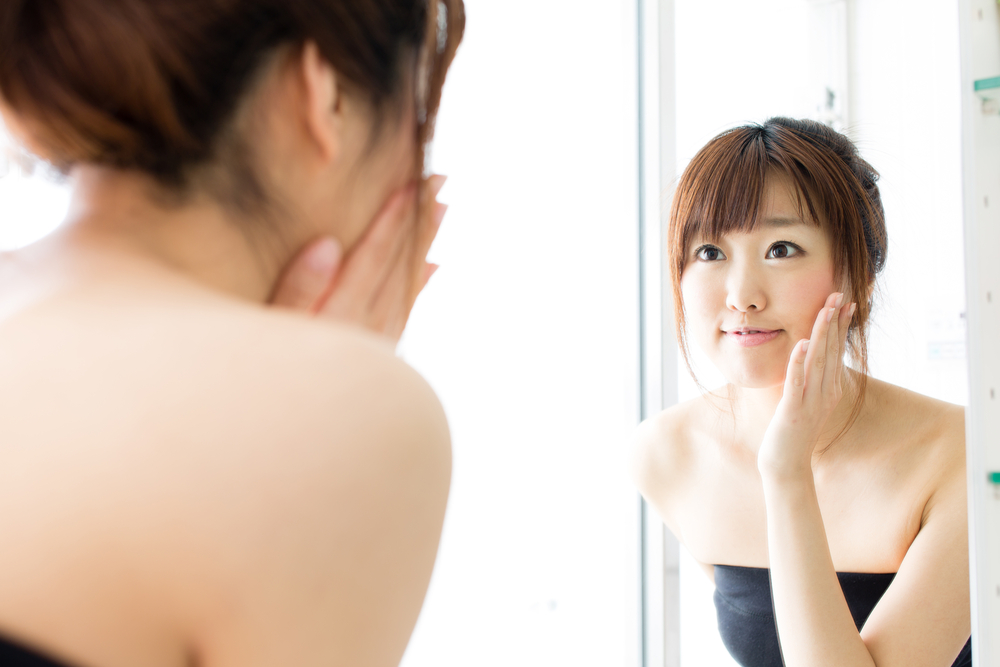 Xray penetration vs exposure Asian girl looking in mirror print