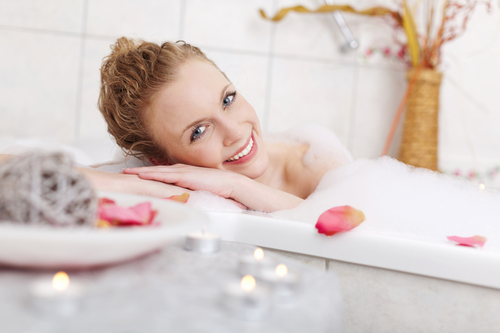 Woman enjoying a bath.